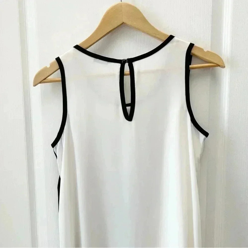 Ricki’s Blouse Sheer Sleeveless Asymmetric Flowy Top Black White Size Small - Picture 6 of 14